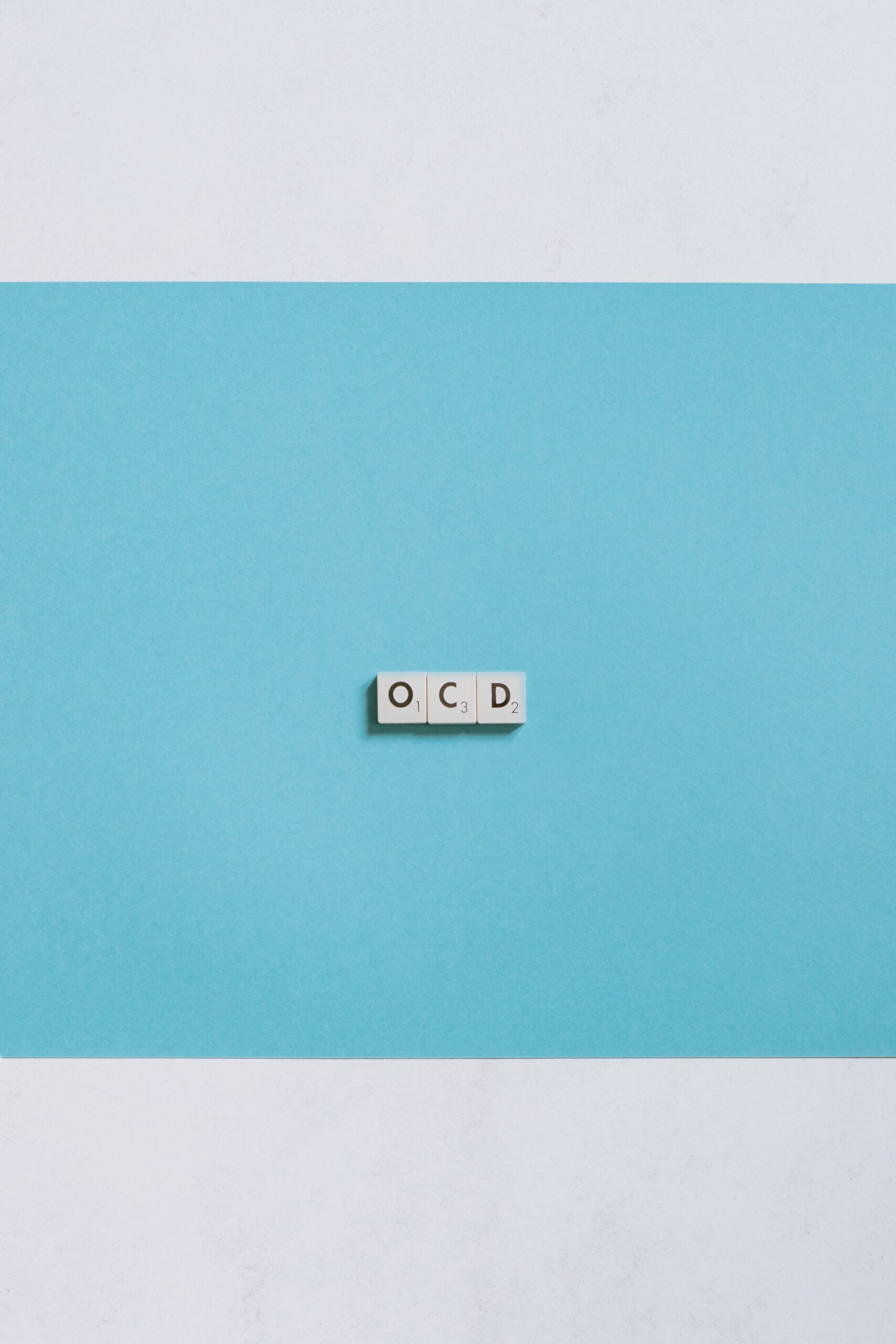 white wall mounted switch on blue wall